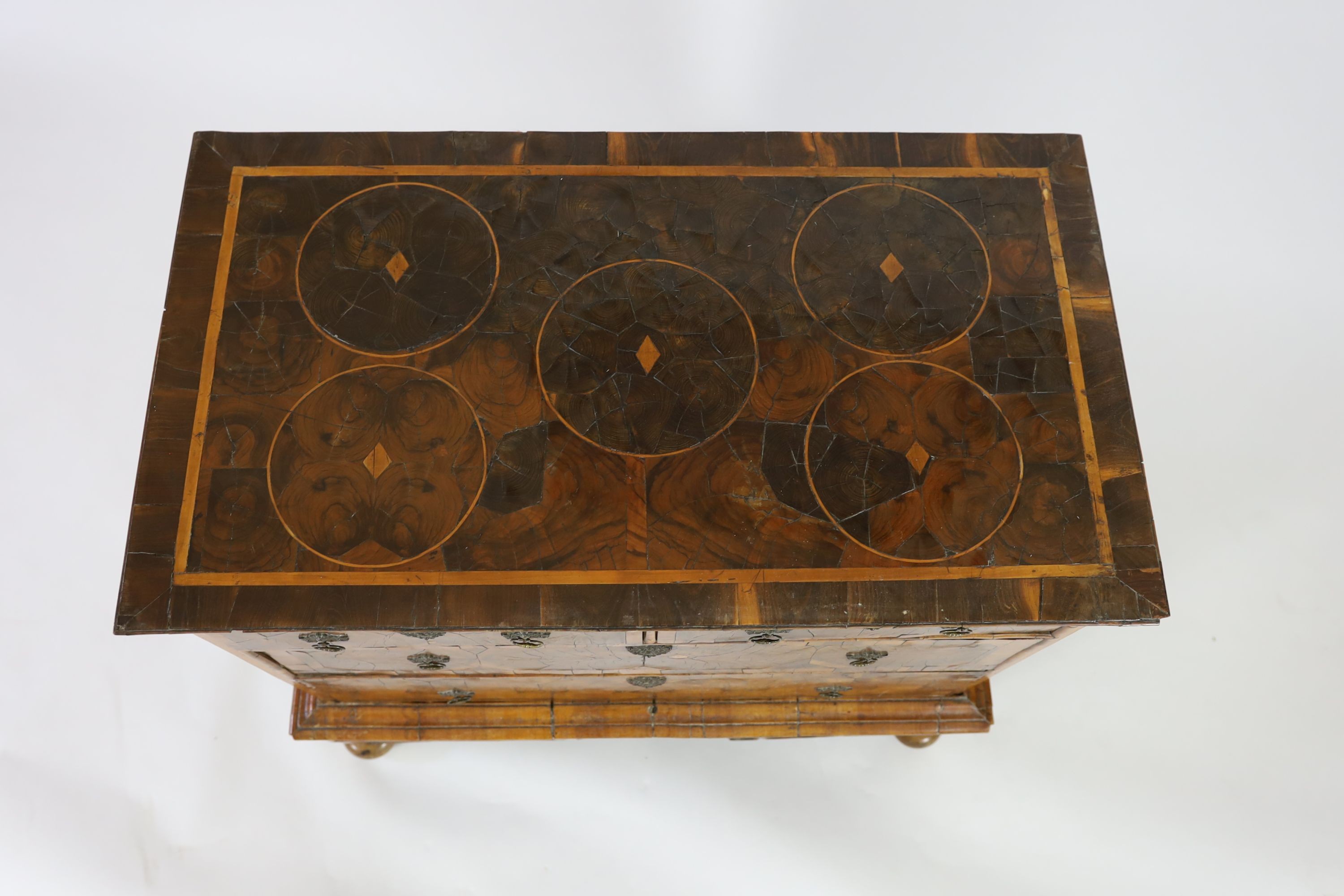 A William and Mary oyster olivewood and kingwood walnut chest on stand, W.97cm D.55cm H.95cm